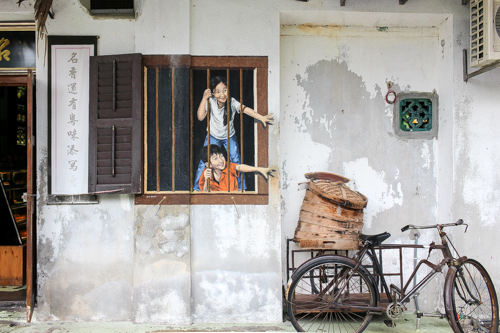 street art in Penang Sibling